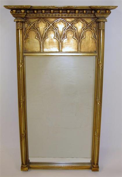 Appraisal: Gothic style giltwoood pier mirror The reverse breakfront top over