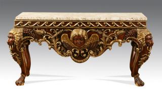 Appraisal: Carved and parcel gilt granite top console Carved and parcel