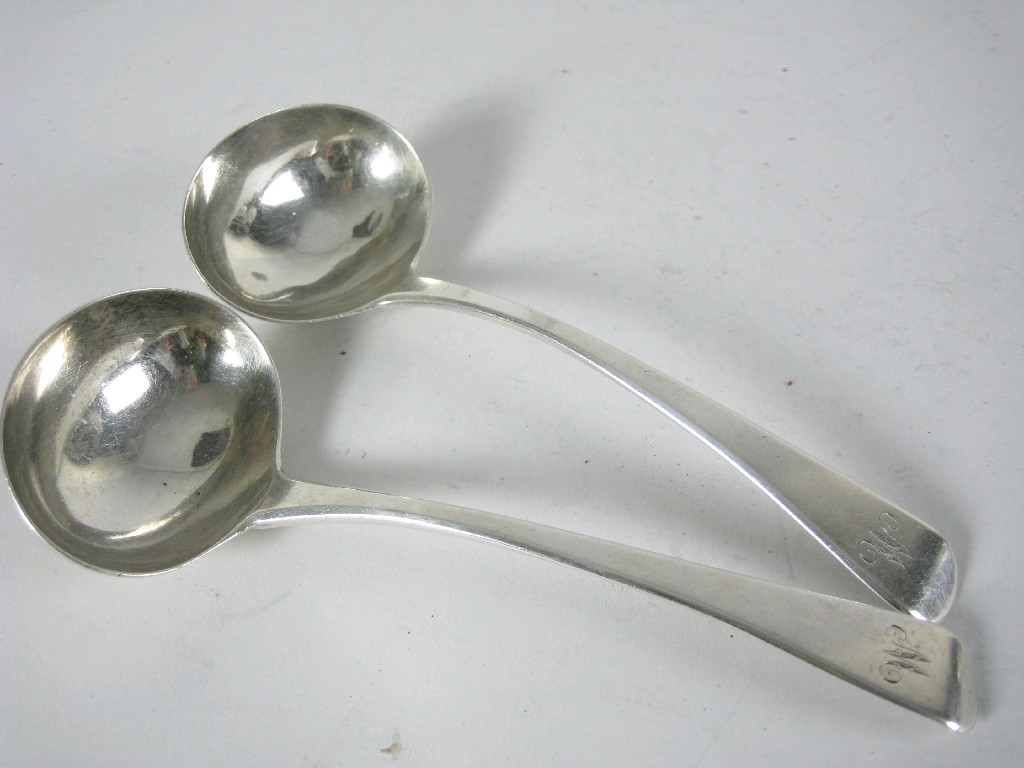 Appraisal: Pair of George III Sauce Ladles old english pattern engraved