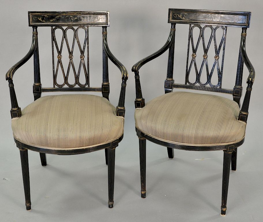 Appraisal: Pair of Sheraton style black armchairs Pair of Sheraton style