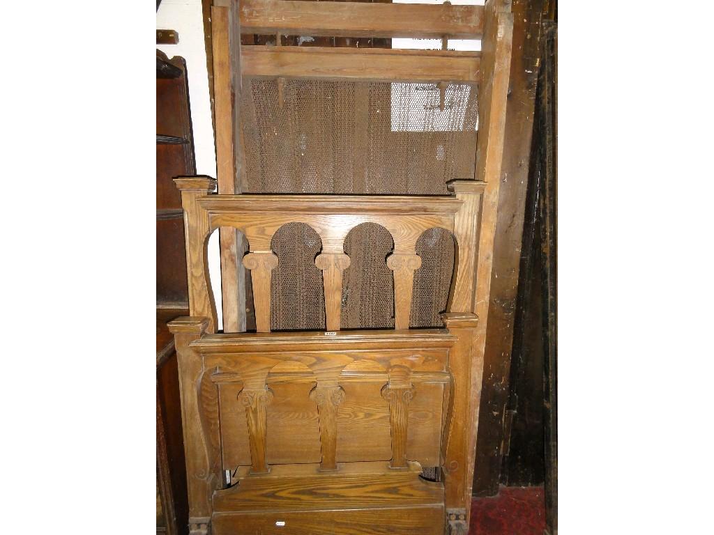 Appraisal: An Edwardian oak single bed stead with architectural style column