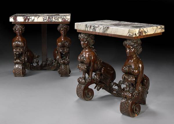 Appraisal: A pair of Palladian style carved walnut console tables in