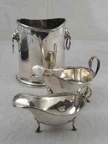 Appraisal: A silver sauceboat London another Birmingham and a soda syphon