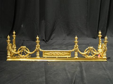 Appraisal: LOUIS XV STYLE GILT BRASS FENDER Decorated with garlands and