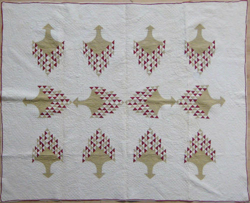 Appraisal: Pieced basket variant quilt th c x together with a