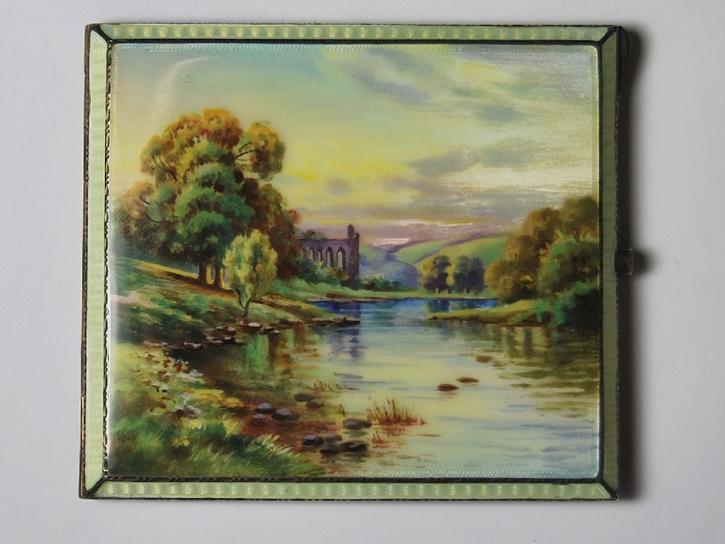 Appraisal: Scenic enamelled silver cigarette case of a river and ruined