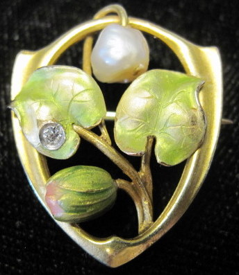 Appraisal: karat yellow gold pearl and diamond enamel pinAccented by green