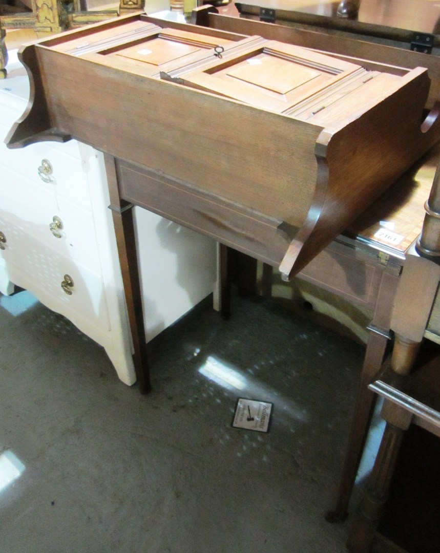 Appraisal: A th century mahogany and satinwood banded foldover card table