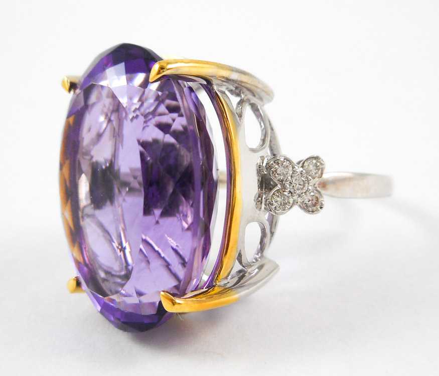 Appraisal: AMETHYST DIAMOND AND FOURTEEN KARAT GOLD RING The white and