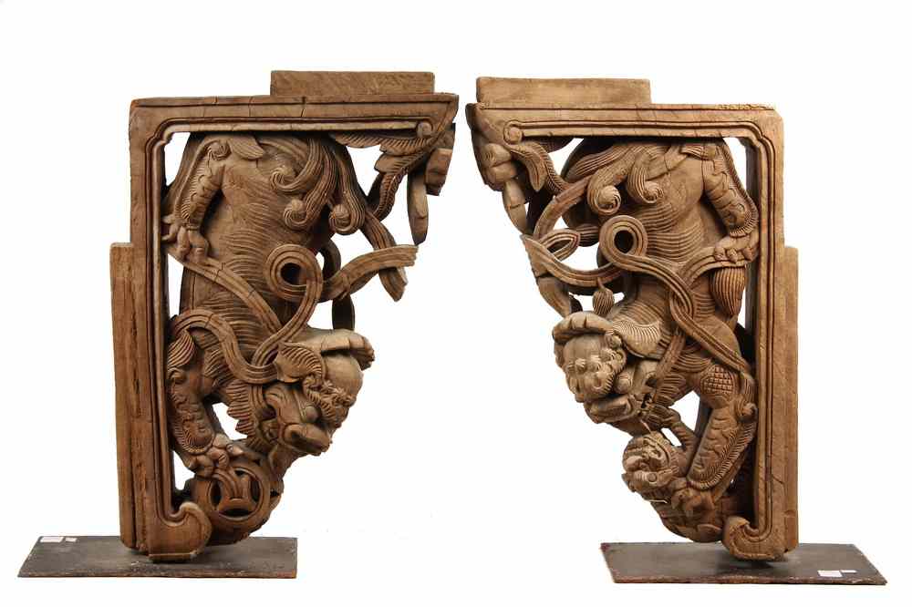 Appraisal: PAIR LARGE CHINESE WOODEN CORBELS - th c or earlier