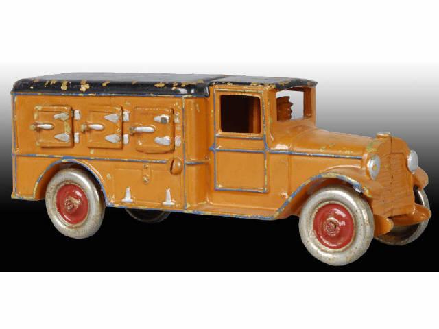 Appraisal: Brass Dent Breyers Ice Cream Truck Toy Description Orange with