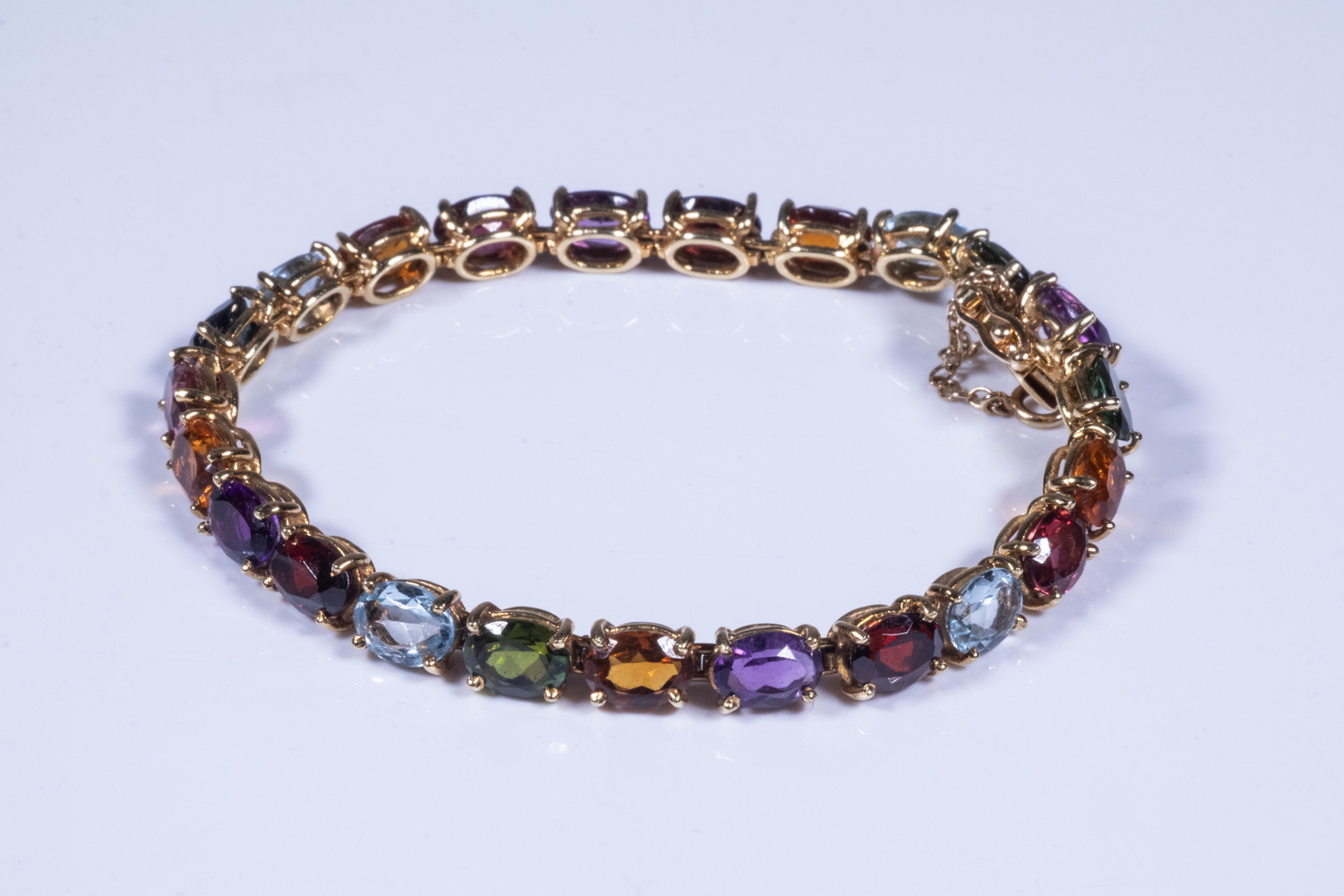 Appraisal: K GEMSTONE BRACELET k gemstone bracelet set with oval faceted