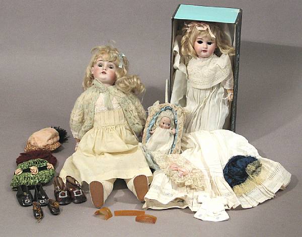 Appraisal: Bisque German Dolls and Clothing Lot features bisque dolls a