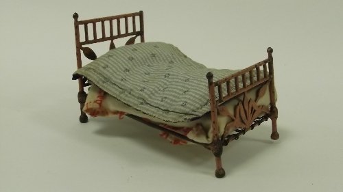 Appraisal: A pink painted iron combination bedstead with strung base the