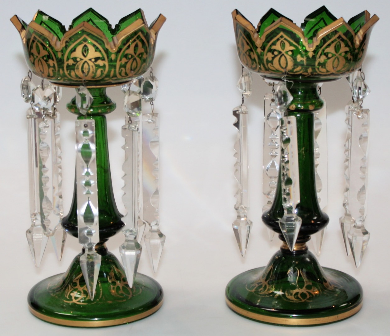 Appraisal: A pair of late thC early thC green glass lustres