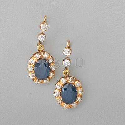 Appraisal: SAPPHIRE AND DIAMOND GOLD DROP EARRINGS Oval faceted blue sapphires