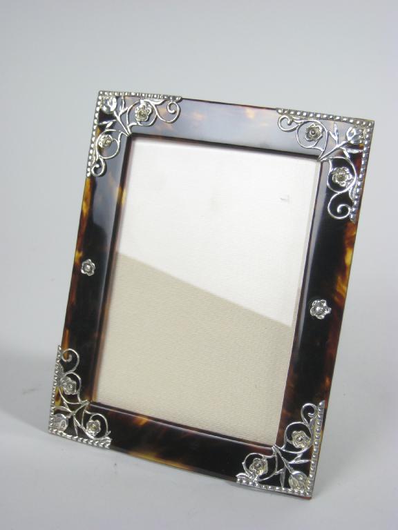 Appraisal: A silver and tortoiseshell mounted rectangular Photograph Frame with floral