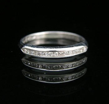 Appraisal: A Delicate Platinum Diamond Band A platinum band feature a