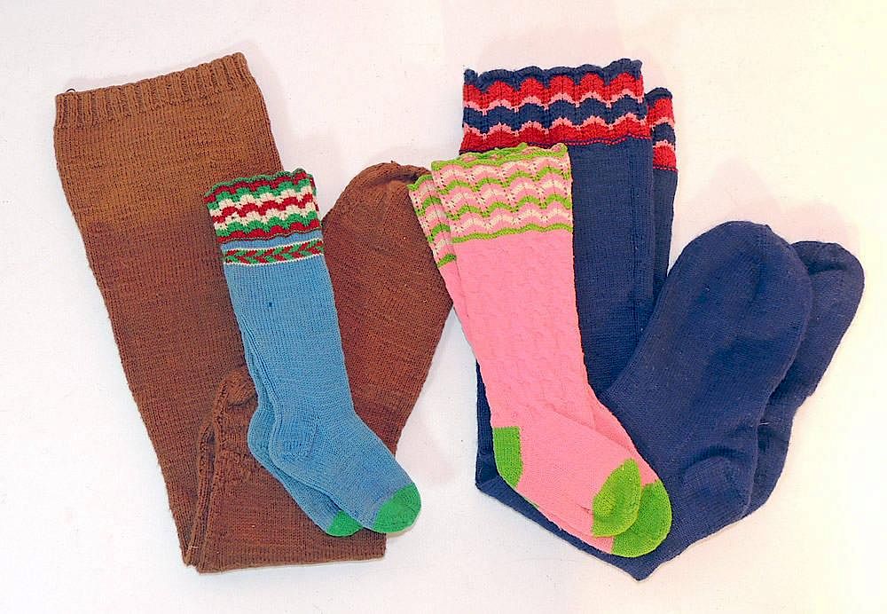 Appraisal: Amish Socks Grouping Four pairs of Lancaster Amish socks To