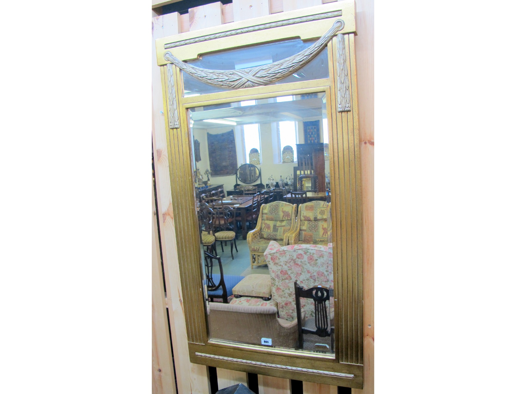 Appraisal: A gilt bevelled wall mirror x cm