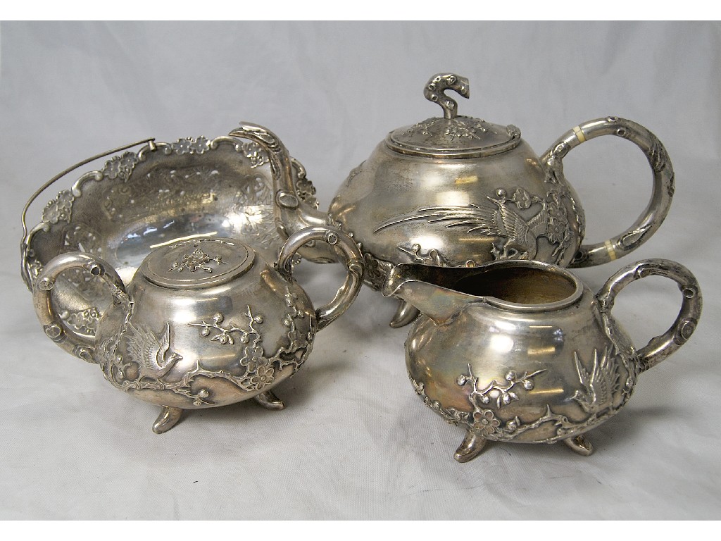 Appraisal: Chinese silver three piece tea service comprising tea pot sugar