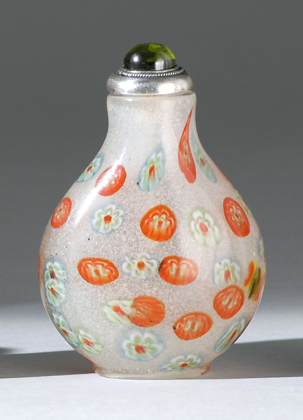 Appraisal: GLASS SNUFF BOTTLE th CenturyIn pear shape with floral canes