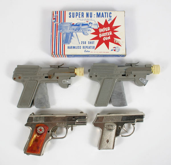 Appraisal: Vintage toy metal cap guns two Nu-Matic cap guns one