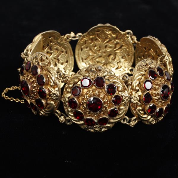 Appraisal: Victorian Edwardian brass garnet crystal medallion bracelet widest point