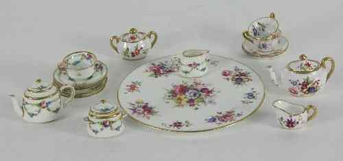 Appraisal: A doll's part tea set by Mintons comprising teapot and