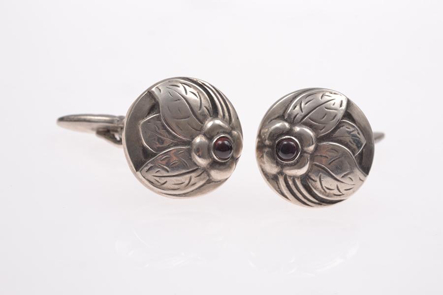 Appraisal: A PAIR OF GARNET SET CUFFLINKS BY GEORG JENSEN IN