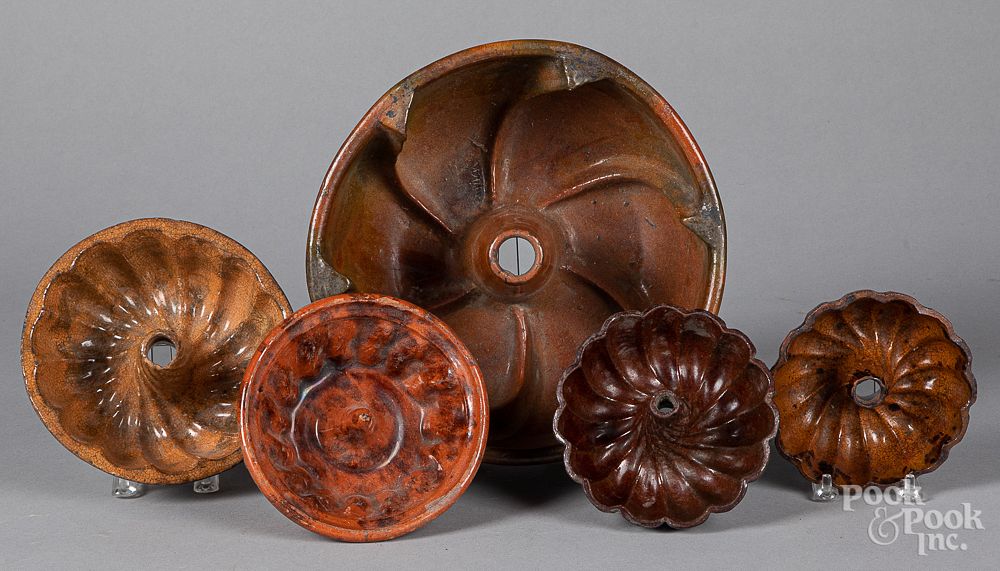 Appraisal: Five redware molds th c Five redware molds th c