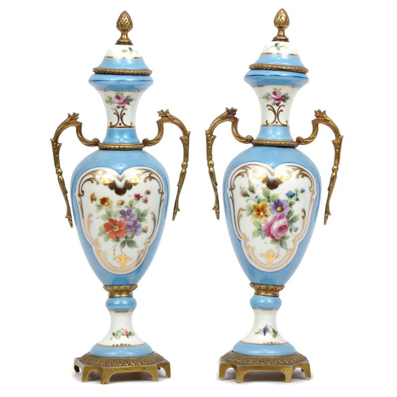 Appraisal: Pair small hand painted French porcelain urns with ormolu handles