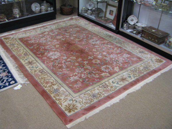 Appraisal: Thick pile with fringe rug ' by ' Floral design