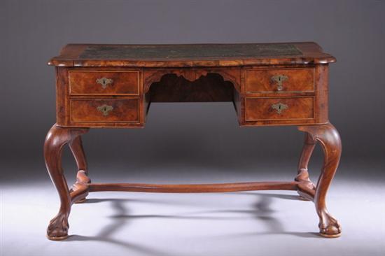 Appraisal: CONTINENTAL GEORGIAN-STYLE BURL WALNUT DESK Late th century Serpentine-fronted facade