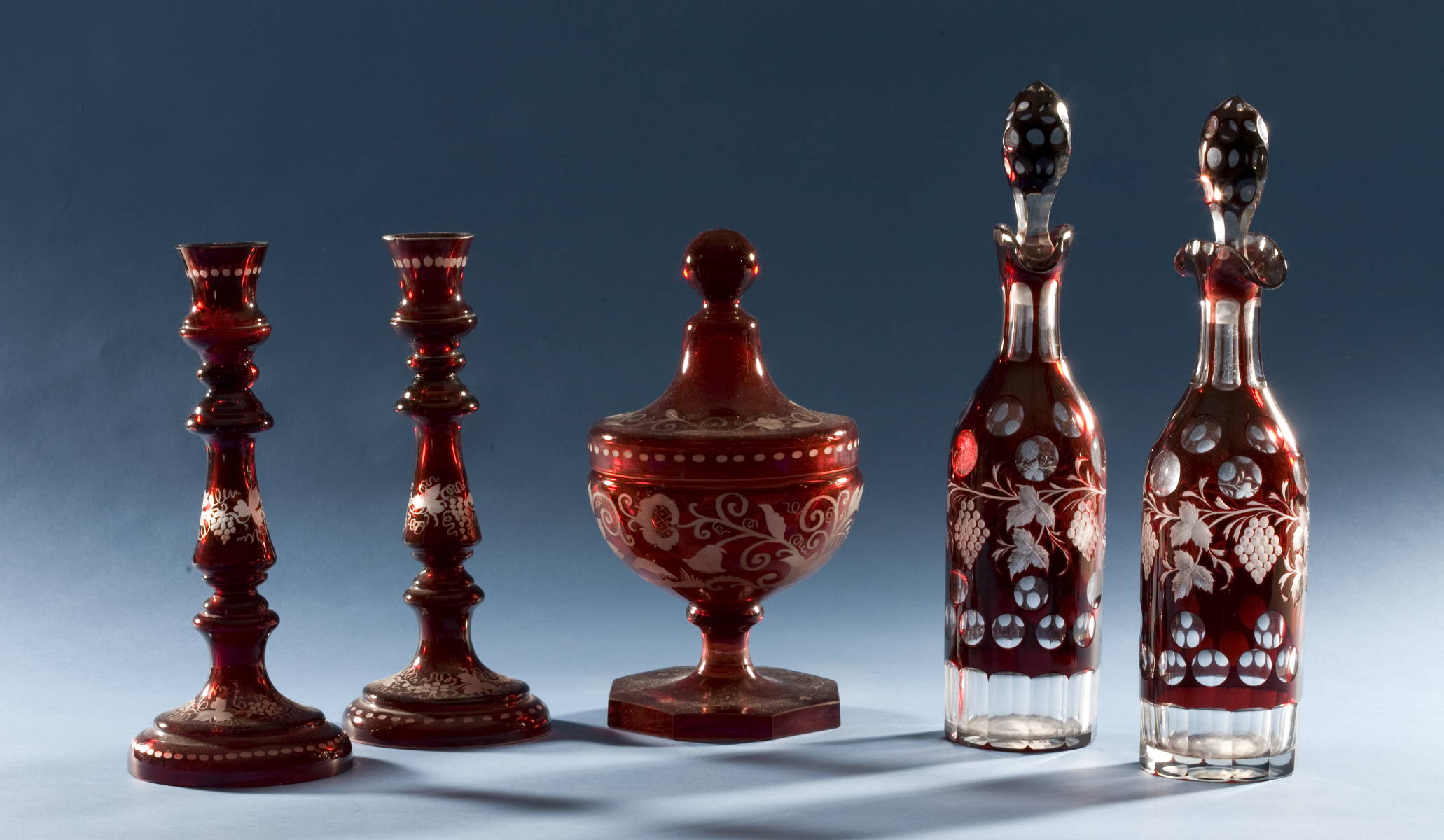 Appraisal: FIVE RUBY FLASHED AND ETCHED BOHEMIAN GLASS TABLE OBJECTS INCLUDING