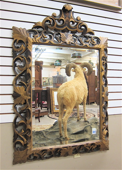 Appraisal: BAROQUE STYLE WALL MIRROR of rectangular form with carved parcel-gilt