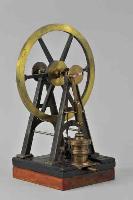 Appraisal: UNUSUAL OVER CRANK DESIGN ENGINE Heavily cast in brass center