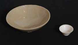 Appraisal: A Stoneware Bowl with Crackled Glaze together with a porcelain