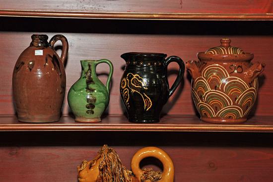 Appraisal: FOUR PIECES OF CONTEMPORARY REDWARE Two jugs by Turtlecreek Potters