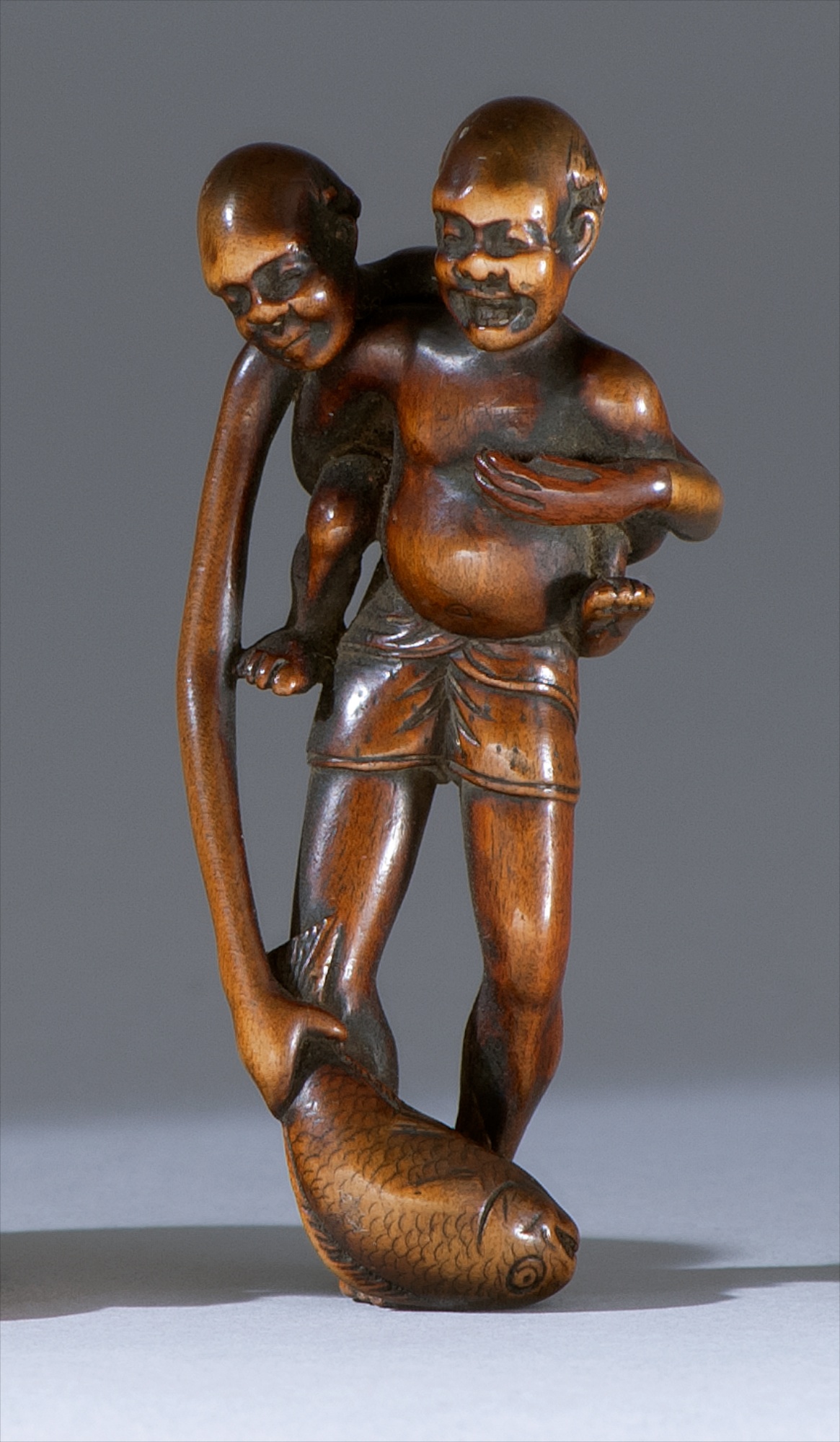 Appraisal: WOOD NETSUKE Early th CenturyIn the form of an ashinaga