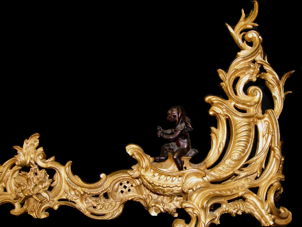 Appraisal: Good th century French ormolu rococo chenet cast overall with