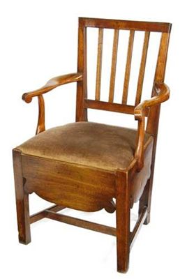 Appraisal: A George III mahogany commode armchair on stretchered supports