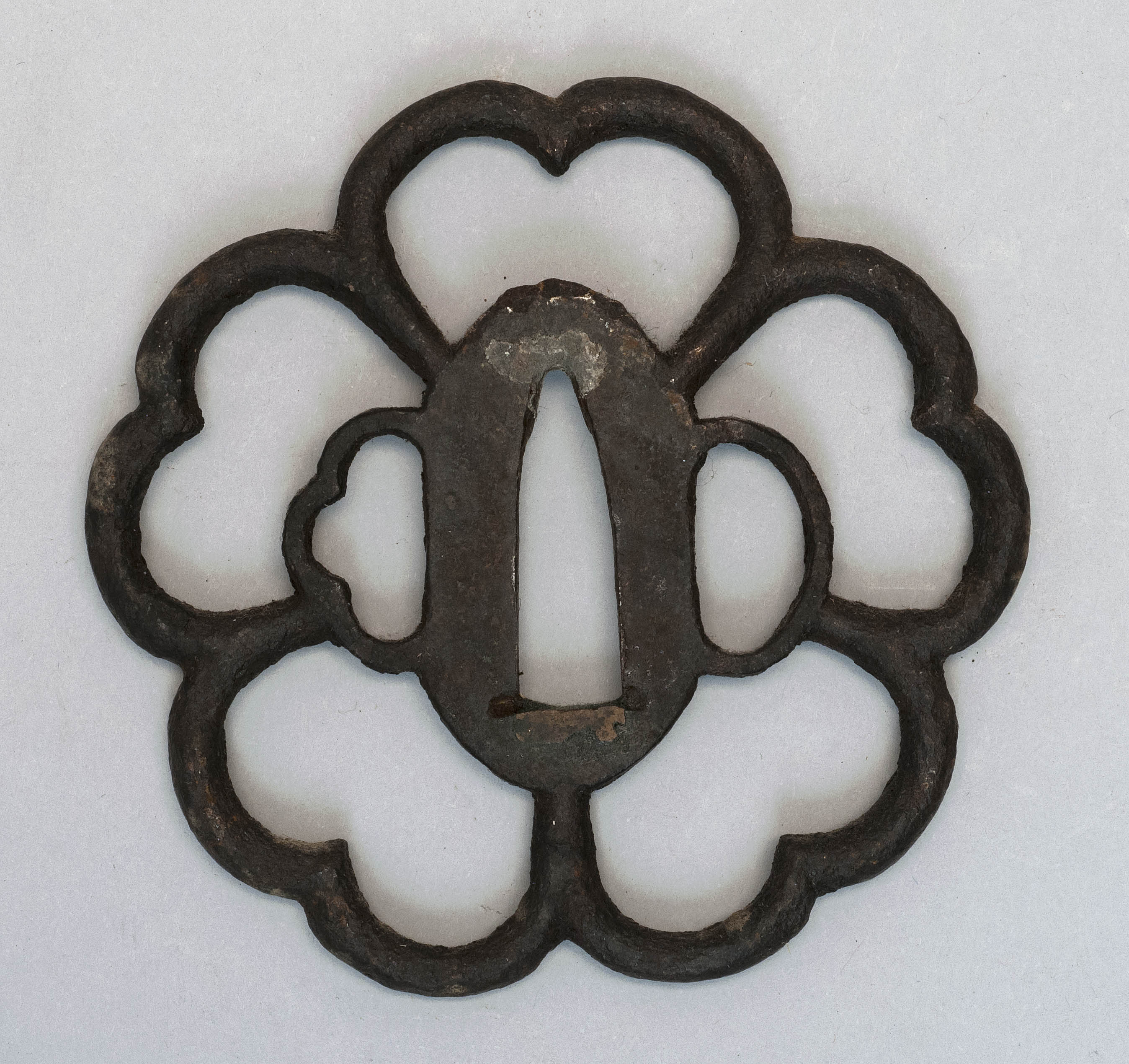 Appraisal: IRON KIKU-FORM TSUBA th th CenturyWith openwork floral design Diameter