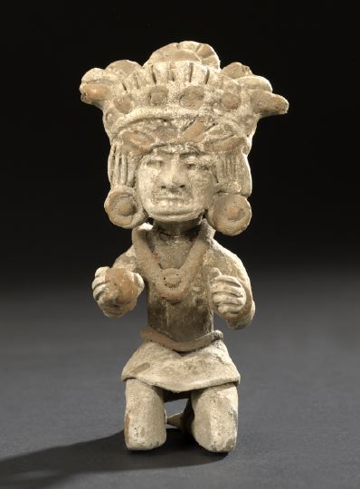 Appraisal: Vera Crux-Style Kneeling Figure depicted wearing elaborate headdress ear plugs