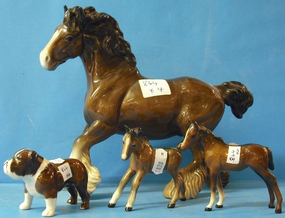 Appraisal: Beswick Cantering Shire Beswick Foal Beswick another foal And Small