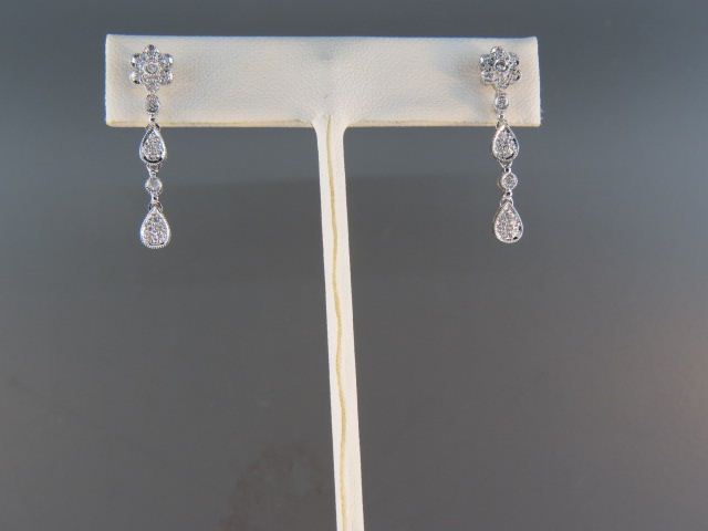 Appraisal: Diamond Earrings diamonds totaling carat k white gold floral dangle