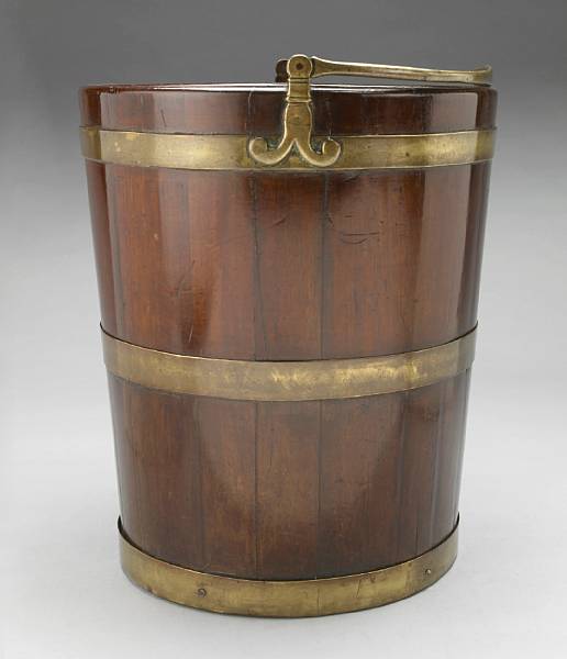 Appraisal: A George III mahogany and brass bound bucket possibly Irish