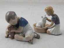 Appraisal: Two Copenhagen B G porcelain groups being a boy with