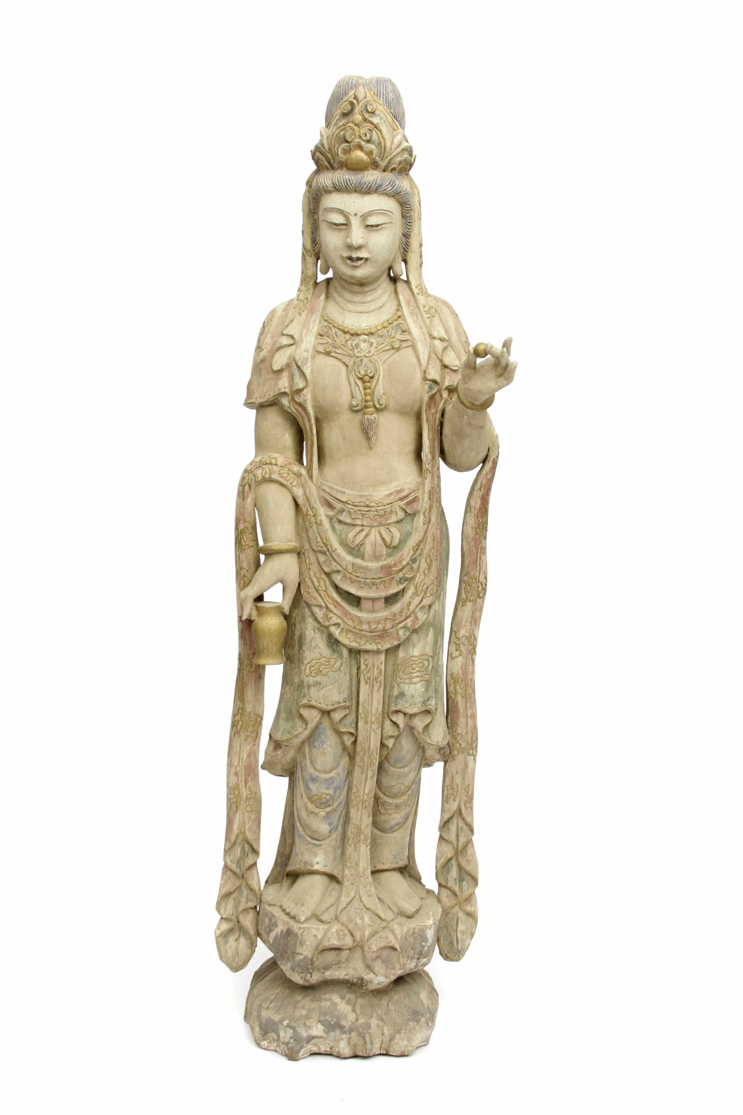 Appraisal: A large paint decorated carved wood figure of Guanyin height