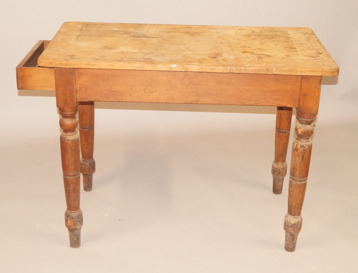 Appraisal: A pine scrub top table on turned legs cm wide